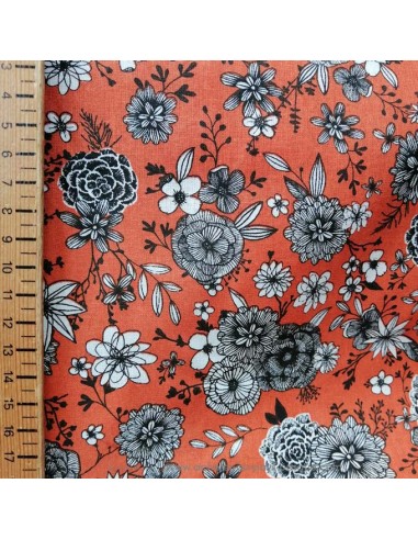 Zoom tissu coton cretonne motifs floraux fond rouille fleur noire et blanche - Tissus Ameublement habillement mercerie