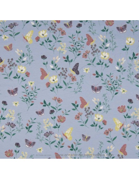 Jersey de coton Oeko-tex imprimé papillon fleurs sur fond bleu poudré - Tissu habillement vente en ligne - vetement couturiere