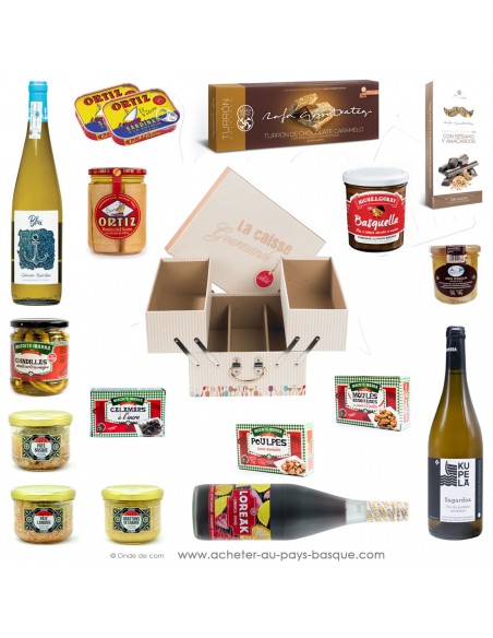 Une caisse coffret cadeau façon caisse à outil pour une dégustation de produits basques : vin, cidre, sangria, pâtés, chocolats