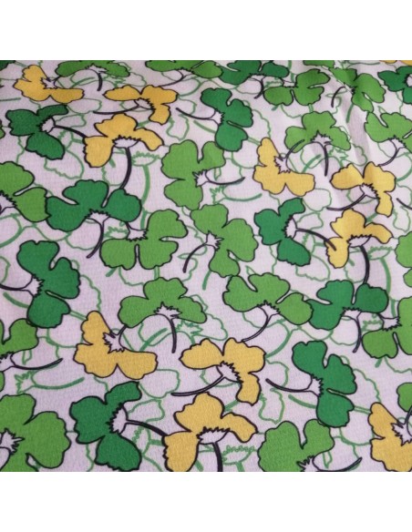 Tissu Piqué polyester blanc trèfles jaunes et verts - tissus habillement au mètre - mercerie vente en ligne Biarritz