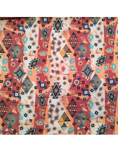 Satin de polyester orange et turquoise motif ethnique - tissu habillement au mètre - mercerie Dock Biarritz