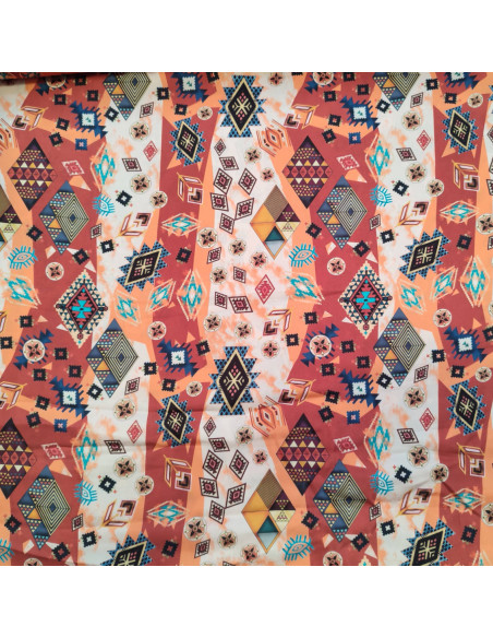 Satin de polyester orange et turquoise motif ethnique - tissu habillement au mètre - mercerie Dock Biarritz