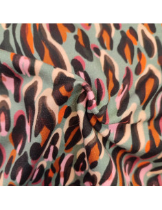 Tissu Jersey coton motif léopard fond vert - Tissus habillement au mètre vente en ligne - vetement couturiere 2