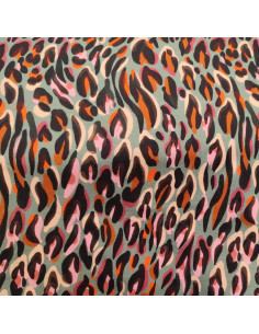 Tissu Jersey coton motif léopard fond vert - Tissus habillement au mètre vente en ligne - vetement couturiere